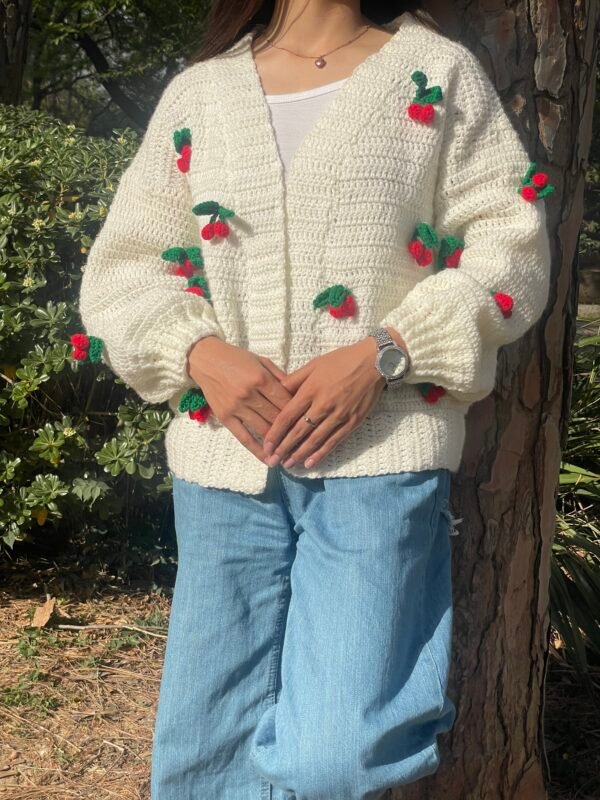 Crochet sweater with cherry design