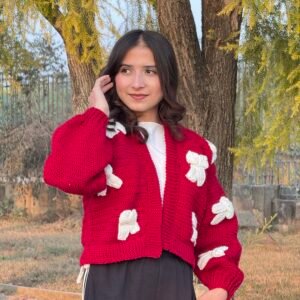Maroon sweater with white bow